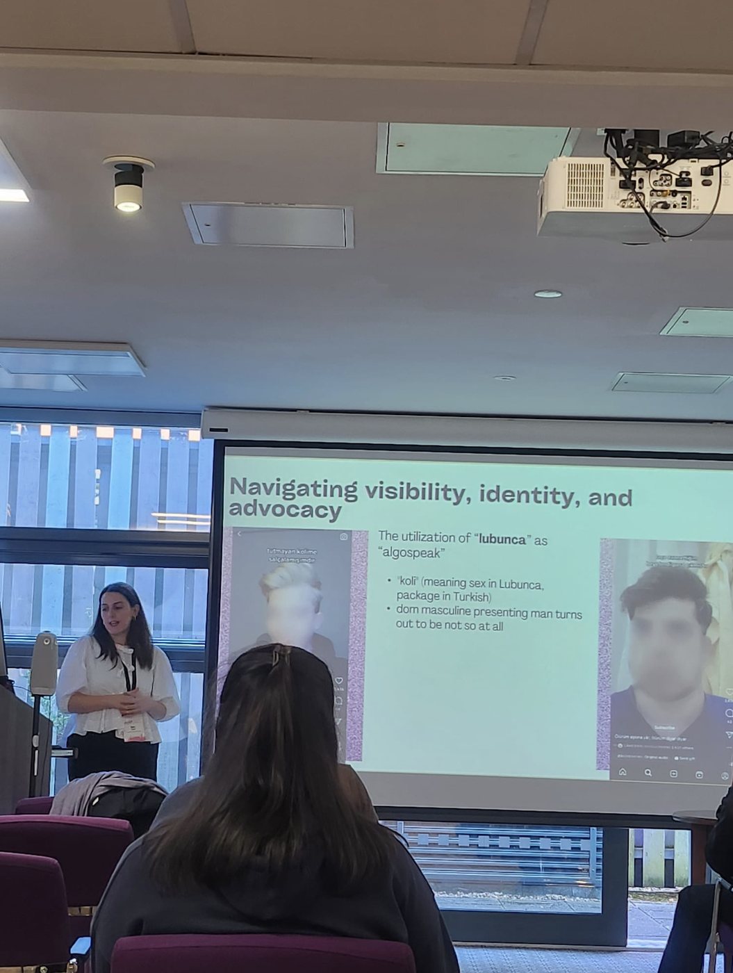Nora Suren presenting on visibility, identity, and advocacy